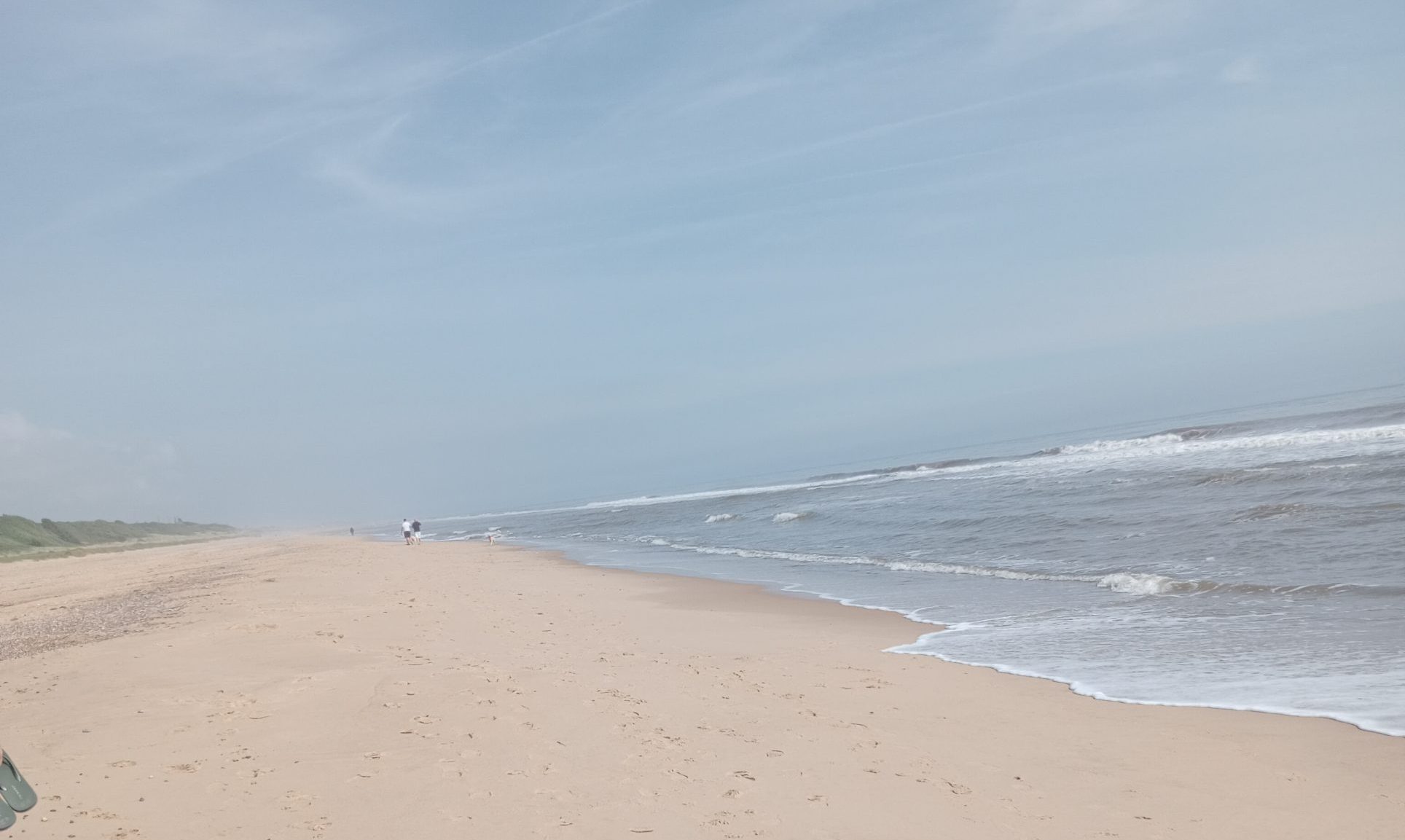 View of the sandy beach near California Cliffs Holiday Park in Great Yarmouth